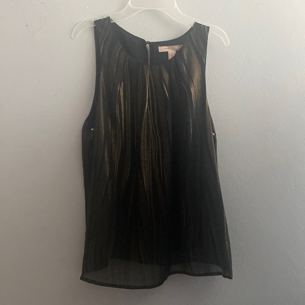 Black and gold fluid tank